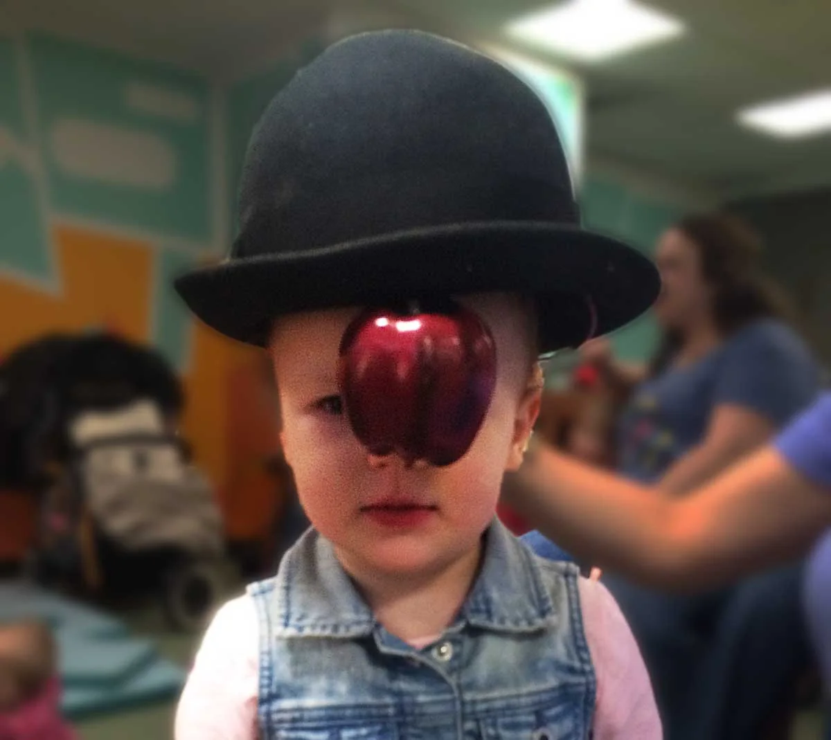 Child in a Magritte-inspired costume