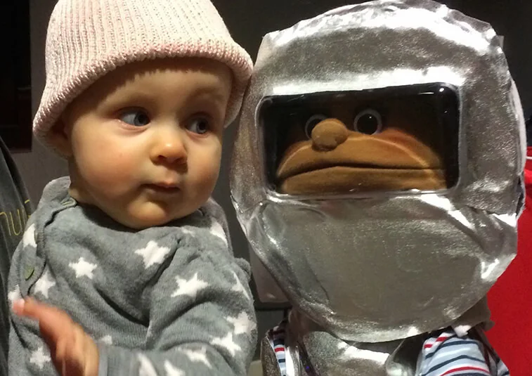 Baby dressed for space travel