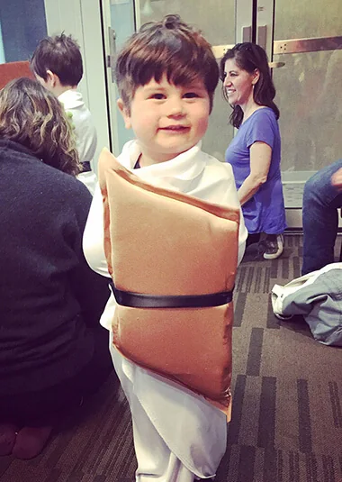 Baby dressed as sushi at Puppetsburg